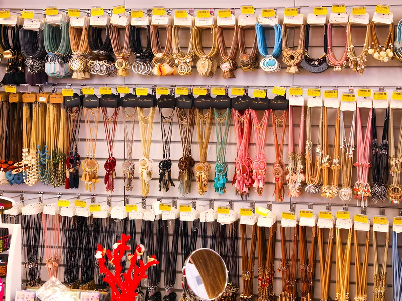Necklace wall at Pound Plus